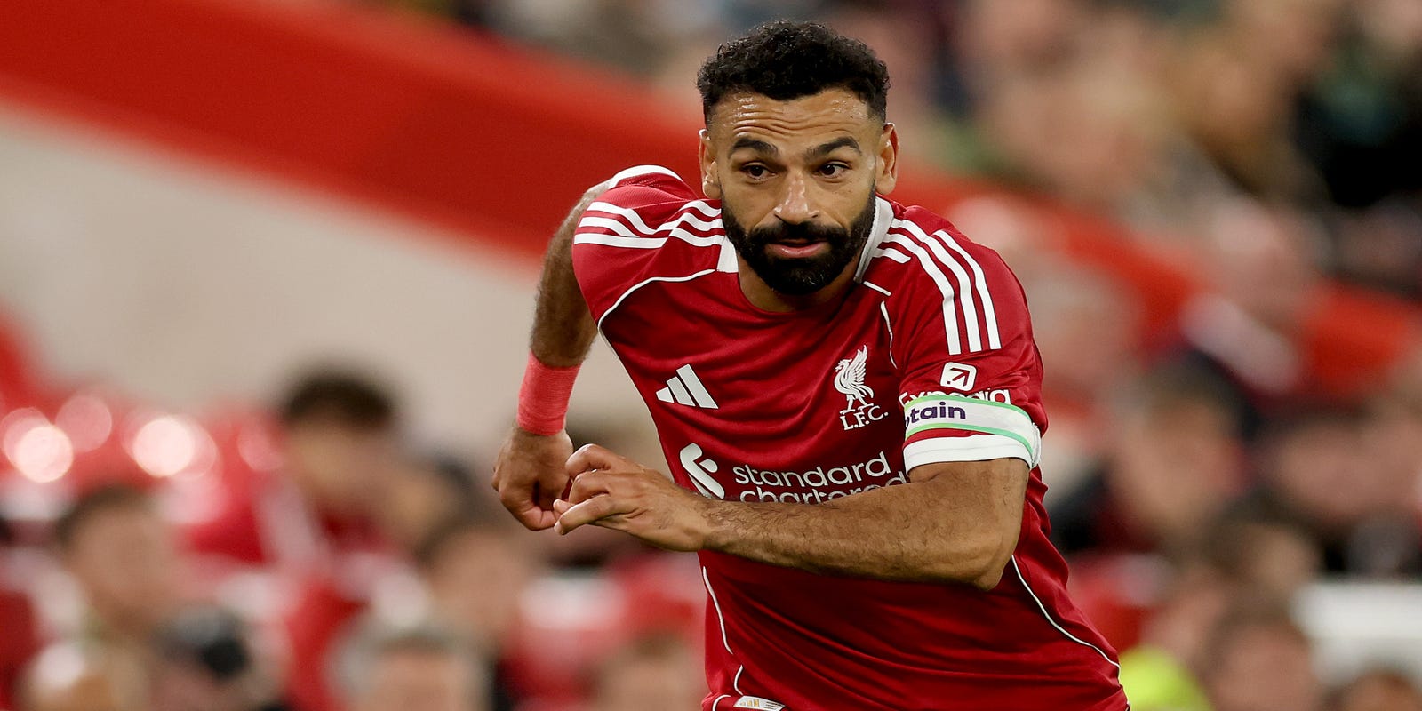 Liverpool Kicks Off Title Defense with Emotional Win over Bournemouth